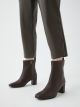 Women's Leather Look Zippered Heeled Boots.