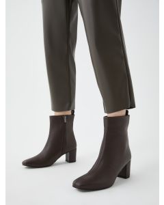 Women's Leather Look Zippered Heeled Boots.