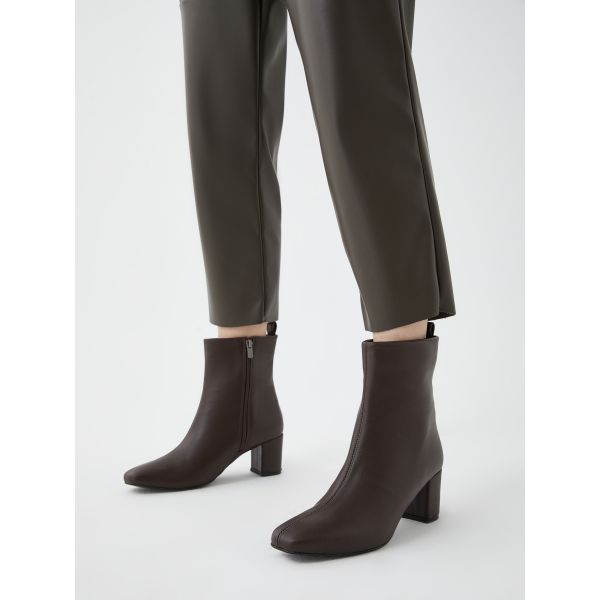 Women's Leather Look Zippered Heeled Boots.